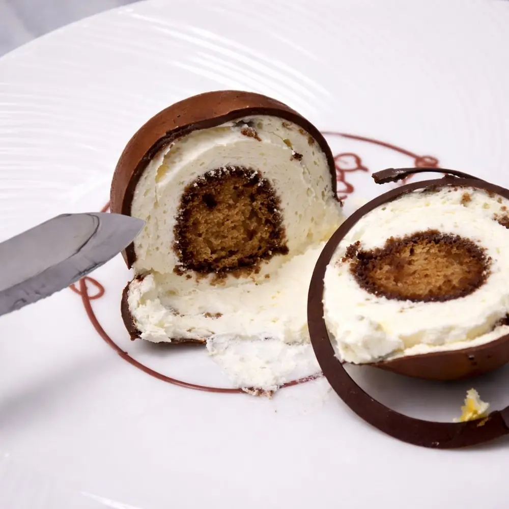 Tiramisu with a rich coffee-infused center -Plated dessert