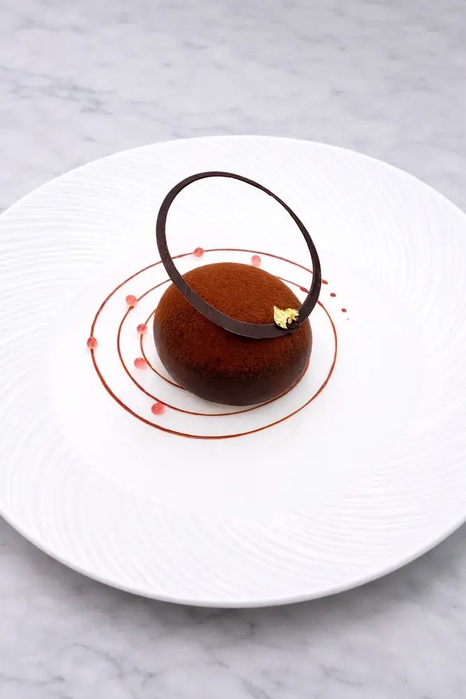 Tiramisu with a rich coffee-infused center -Plated dessert