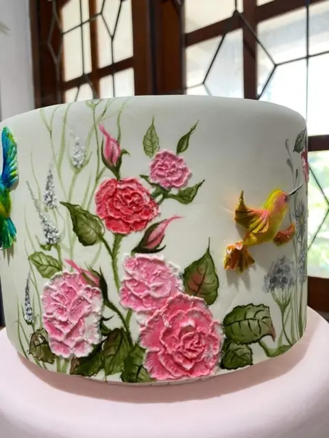 Painted roses and hummingbird